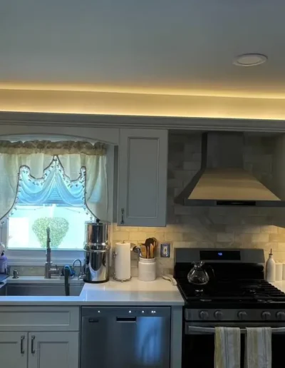 After renovation photo of the kitchen, showcasing upgraded finishes, improved structure, and refined craftsmanship.