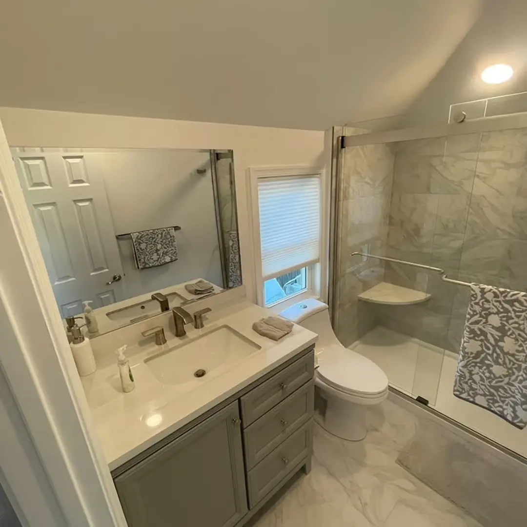 After renovation photo of the kitchen, showcasing upgraded finishes, improved structure, and refined craftsmanship.