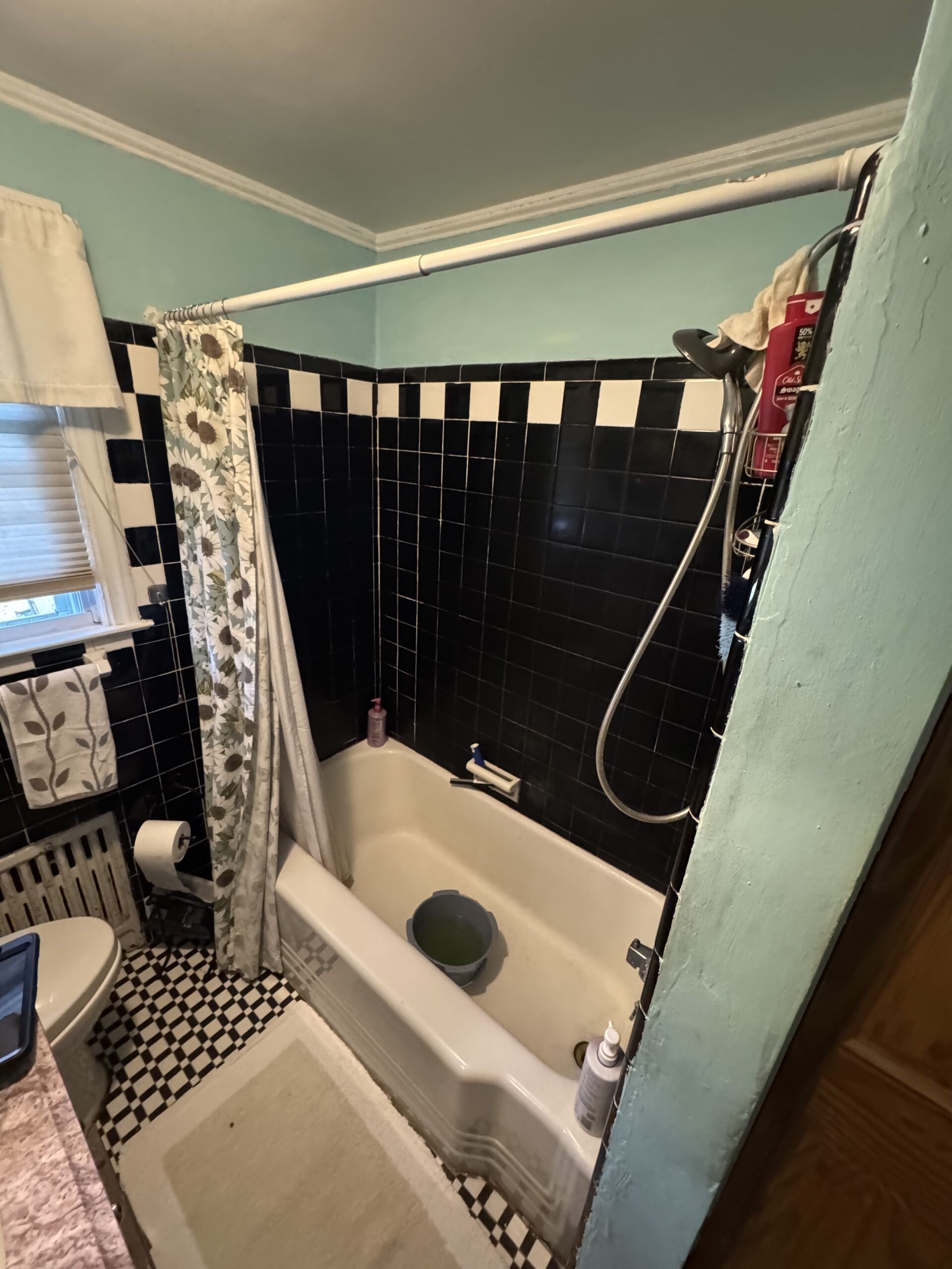 Before photo of the space, capturing its original layout, materials, and condition prior to renovation.