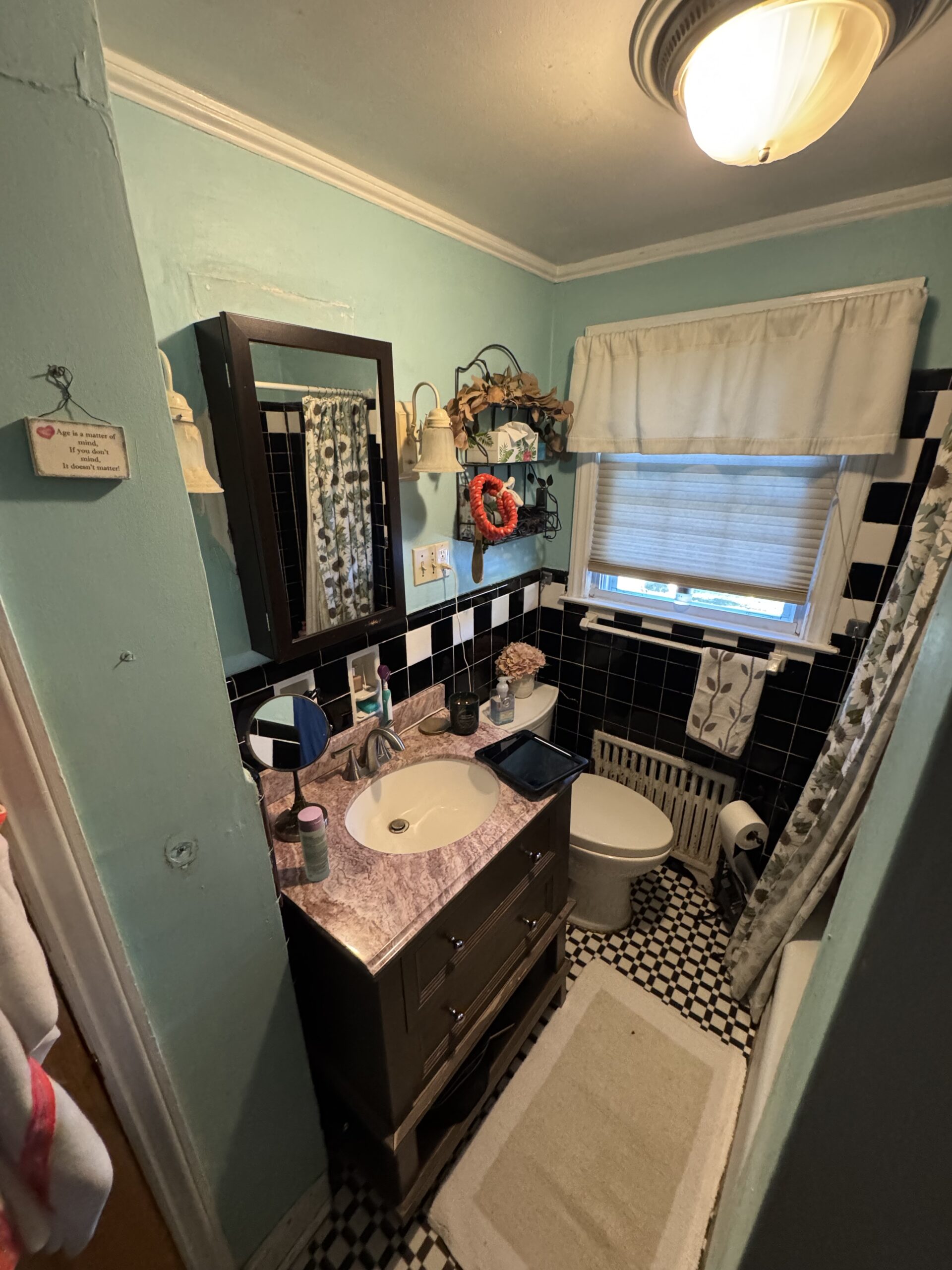 Before photo of the space, capturing its original layout, materials, and condition prior to renovation.