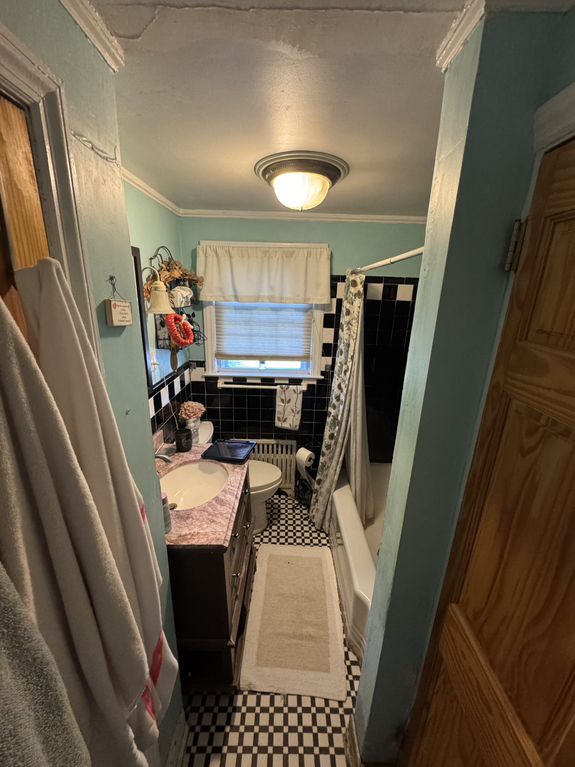 Before photo of the space, capturing its original layout, materials, and condition prior to renovation.